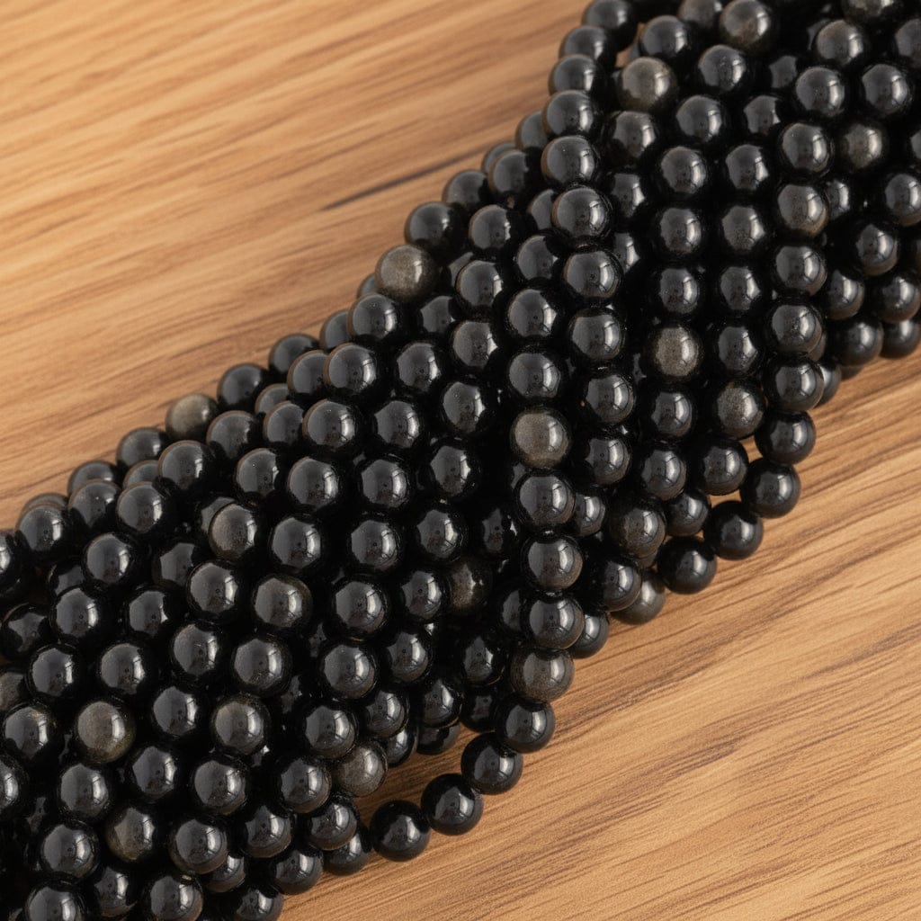 FIL DE PERLES 8MM OBSIDIENNE DORÉE