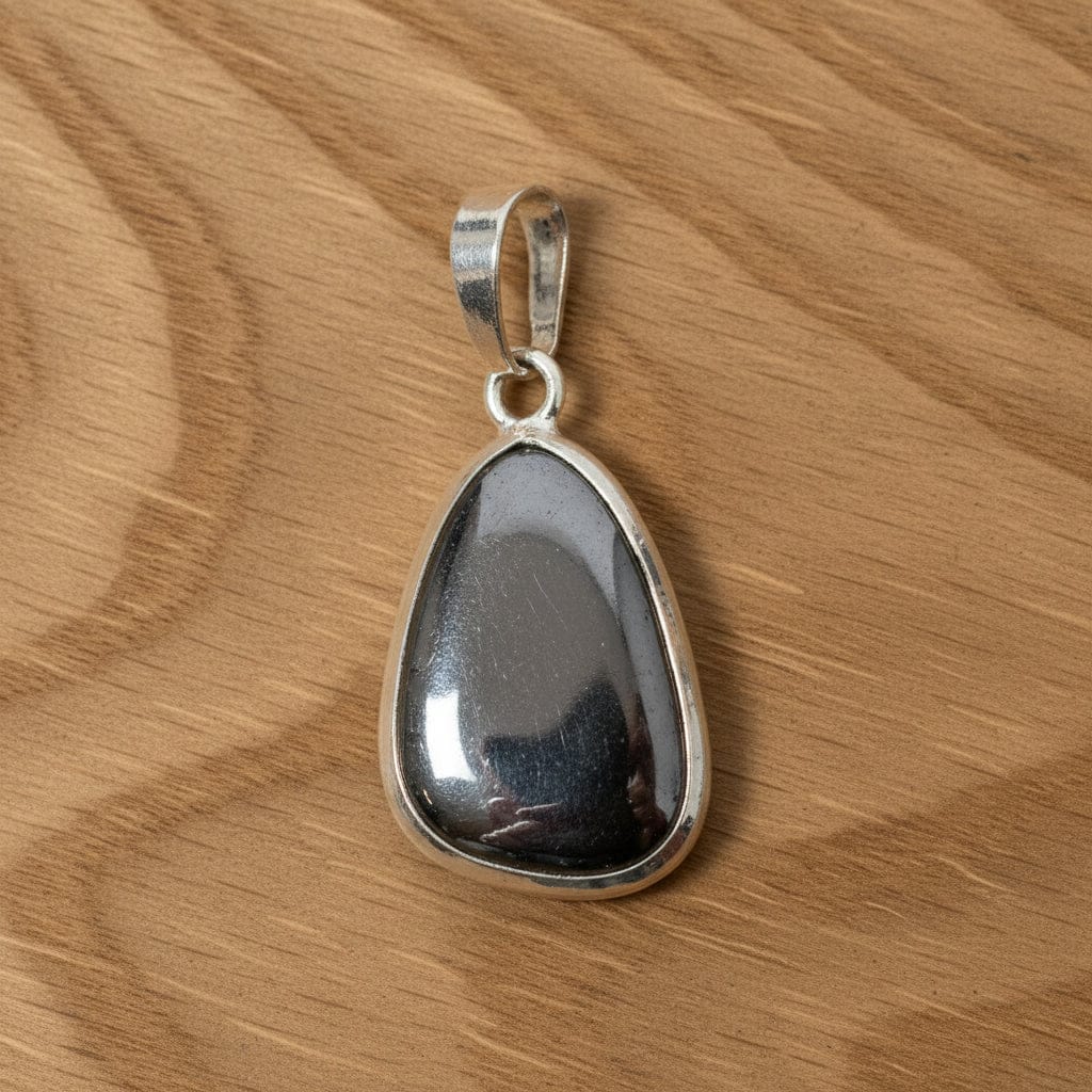 PENDENTIFS PIERRES ROULÉES SUR BÉLIÈRE HÉMATITE